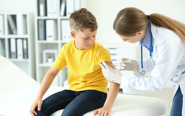 A GP administering Insulin in a young Type 1 diabetic patient for it's management